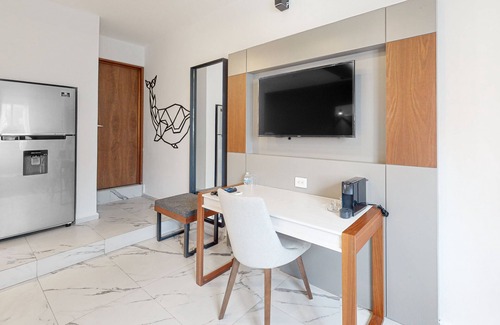 Downtown Cancun Hotel | Dazzling, centrally located apartment with luxe finishes and a shared pool