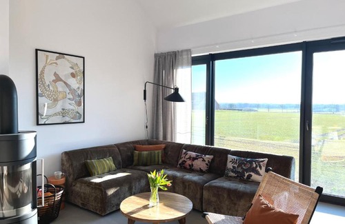 Hohwacht Apartment | De ole School - großzügiges Loft mit Kamin (Apt. 23)