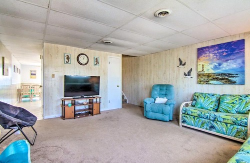 Caine Woods House | Deck with Canal Access Ocean City Townhome