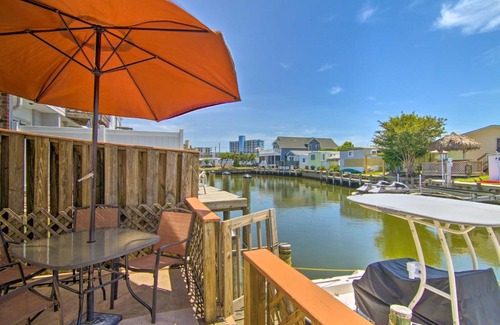 Caine Woods House | Deck with Canal Access Ocean City Townhome