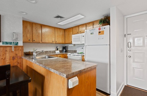 Gatlinburg - Pigeon Forge Condo | Deer Ridge E208 | Fireplace, Resort Amenities