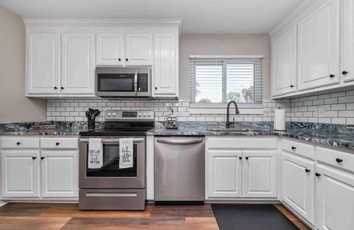 Hampton House | Delightful 4-bedroom home with game room!