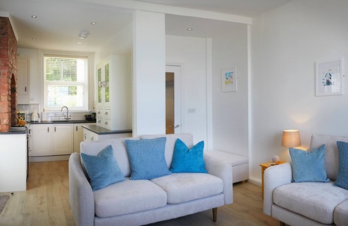 Muston Apartment | Delightful beachfront apartment, 2 bedroom, sleeps 4 - parking & stunning views.