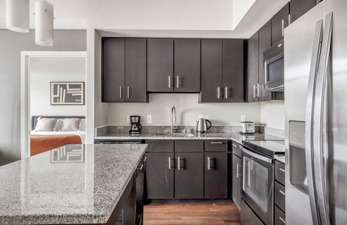Woodmont Triangle Apartment | Delightful Bethesda Bainbridge 2BR w/Rooftop Pool & W/D, nr Dining, by Blueground