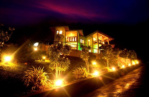 Kandy Villa | Deluxe Family room with balcony and mountain view.