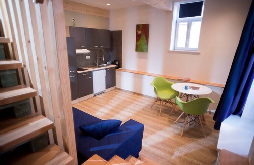 Marktheidenfeld Apartment | Der einstige TAUBENSCHLAG in der Hofstallung, 2-geschossiges Deluxe-Maisonette-Apartment
