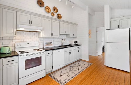 Ocean Bay Park House | Designer beach cottage & studio with bikes, outdoor shower, deck - walk to beach