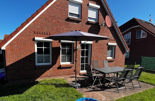 Neßmersiel House | Detached vacation home in Nessmersiel (near Deich) with private garden & wallbox