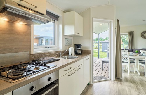 Suesel House | Detached vacation home Wellenkönig in Süsel with terrace by the lake and WLAN