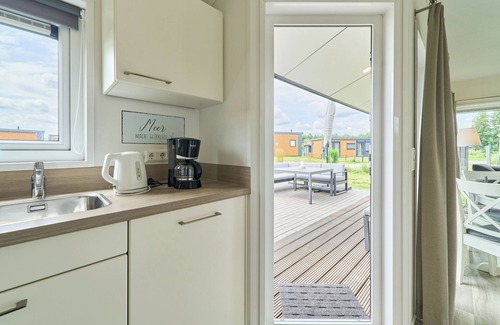 Suesel House | Detached vacation home Wellenkönig in Süsel with terrace by the lake and WLAN