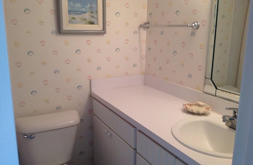 Avon By The Sea Condo | Direct Beach Access, ground floor corner unit, freshly updated in cozy setting.