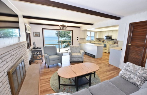 Suttons Bay House | Direct waterfront on West Grand Traverse Bay! Overlooking deck