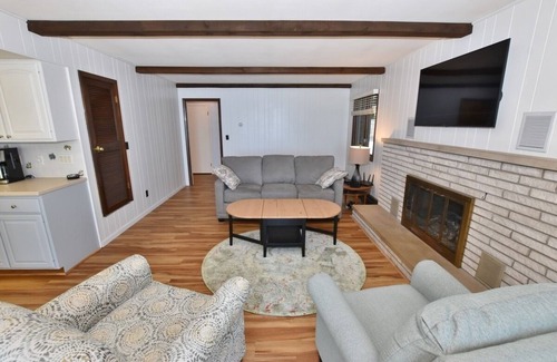 Suttons Bay House | Direct waterfront on West Grand Traverse Bay! Overlooking deck