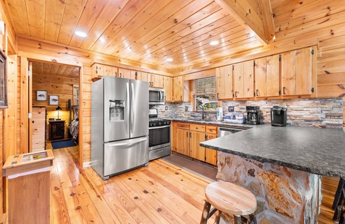 Cherry Log Cabin | Directly on Big Creek/Hot Tub/Game Room/Outdoor Living Space/Remote/True Cabin