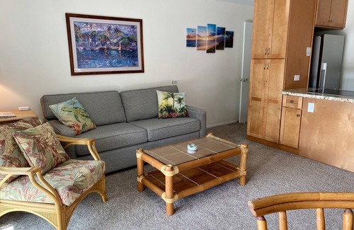 Kihei Condo | Discounted! Partial ocean view condo with pool & just steps to beach.