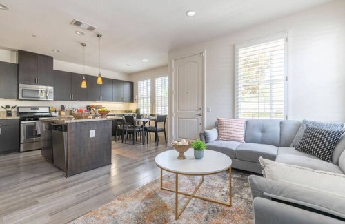 Azusa House | Discover comfort and convenience in this spacious 3-bedroom, 2.5-bathroom townhouse with king-sized beds, high-speed internet, a 2-car garage, and a prime central location.
