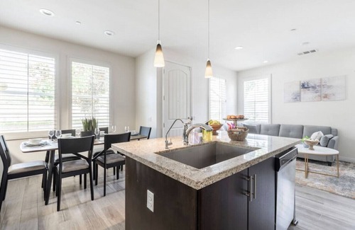 Azusa House | Discover comfort and convenience in this spacious 3-bedroom, 2.5-bathroom townhouse with king-sized beds, high-speed internet, a 2-car garage, and a prime central location.