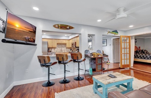 Florida North Atlantic Coast House | Discover the ultimate getaway at our stylish 3-bedroom retreat featuring 7 cozy beds, 2 modern bathrooms, a private pool, hot tub (extra fee), outdoor TV, BBQ grill, and a refreshing outdoor shower—your perfect blend of comfort, relaxation, and fun.