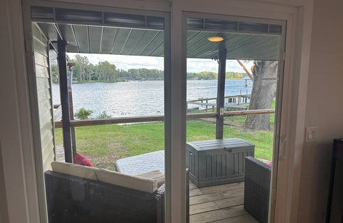 Land O' Lakes Cabin | Discover tucked away 5-bedroom lakefront cabin getaway in Land O' Lakes with AC