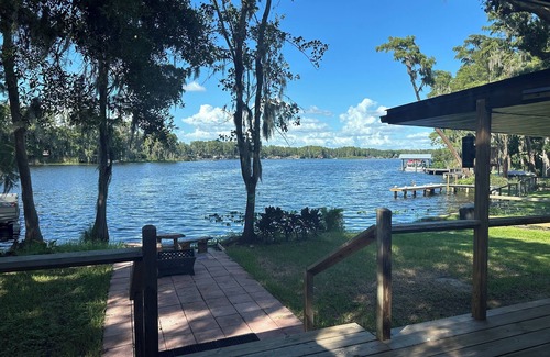 Land O' Lakes Cabin | Discover tucked away 5-bedroom lakefront cabin getaway in Land O' Lakes with AC