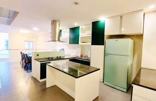 Downtown Ho Chi Minh City House | District 1 House 4-Bedroom Oasis: Steps to Iconic Ben Thanh