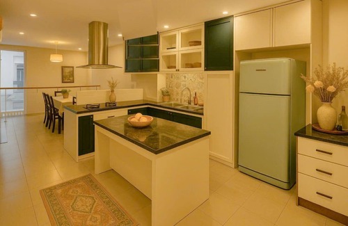 Downtown Ho Chi Minh City House | District 1 House 4-Bedroom Oasis: Steps to Iconic Ben Thanh