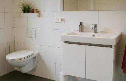 Nordhorn House | Dock 61 - tolles Ferienhaus für bis zu 4 Personen mit Kaminofen und Sauna - Haustiere herzlich willkommen, direkt am Wasser gelegen