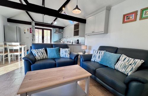 Dilham House | Dog and family friendly barn conversion with fully enclosed garden and hot tub