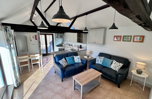 Dilham House | Dog and family friendly barn conversion with fully enclosed garden and hot tub