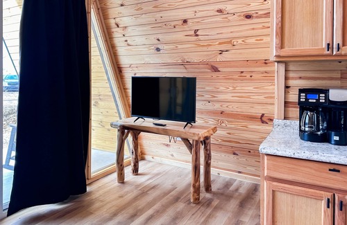 Newport Cabin | Dog-friendly A-frame cabin with loft, balcony, full kitchen, & washer/dryer