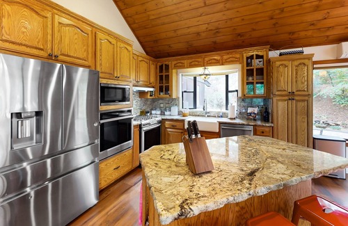 Applegate House | Dog-friendly cabin on a working goat farm with private deck, firepit & fireplace