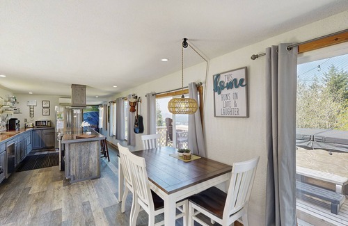 Port Orford Cabin | Dog-friendly cabin tucked Into the trees with WiFi, washer/dryer, & ocean views