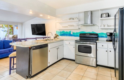 Coral Ridge Isles House | Dog-friendly coastal duplex with patio, grill, AC, & washer/dryer - near beach
