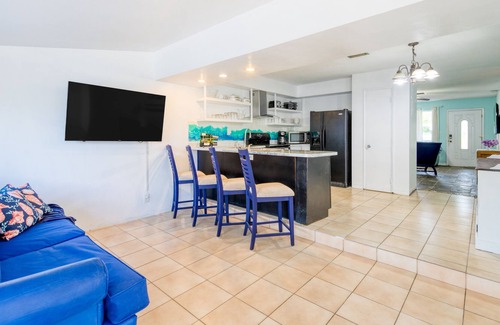 Coral Ridge Isles House | Dog-friendly coastal duplex with patio, grill, AC, & washer/dryer - near beach