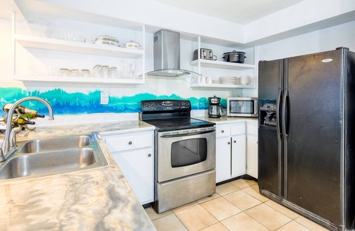 Coral Ridge Isles House | Dog-friendly coastal duplex with patio, grill, AC, & washer/dryer - near beach