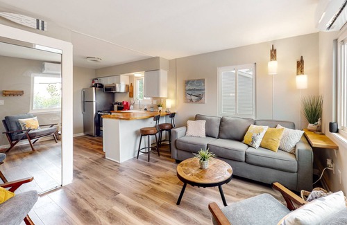 Caine Woods Condo | Dog-friendly condo near beach with updated interior & private W/D