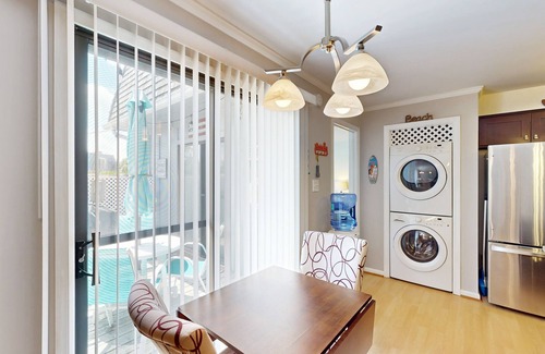 Kitty Hawk Condo | Dog-friendly condo with pool, tennis court, and modern amenities