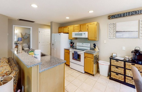 St. James Condo | Dog-friendly condo with pool access, private balcony, W/D, & central AC