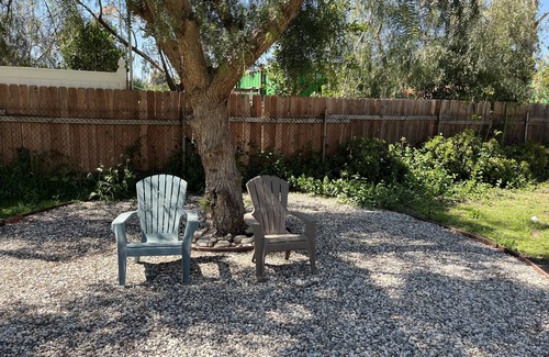 Sunland House | Dog friendly cottage with porch, pool, massive yard, and plenty of parking.