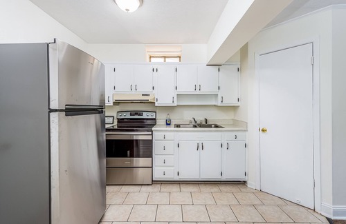Flat Rock Condo | Dog-friendly gem on the lake with pool, beach, lush acreage, fast WiFi & kitchen
