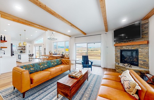 Grand Elk Ranch House | Dog-friendly golf course-front home with mtn & ski views, fireplace, & balconies