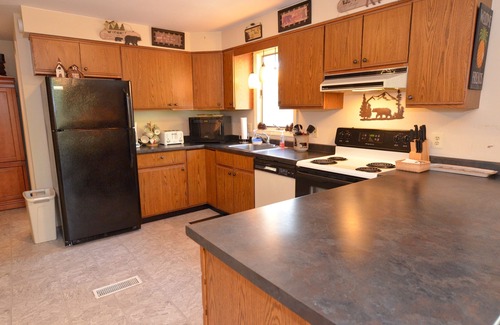 Eidelweiss Village House | Dog Friendly Home, Close to the Beach w/Canoe, Brookside w/Wooded Yard