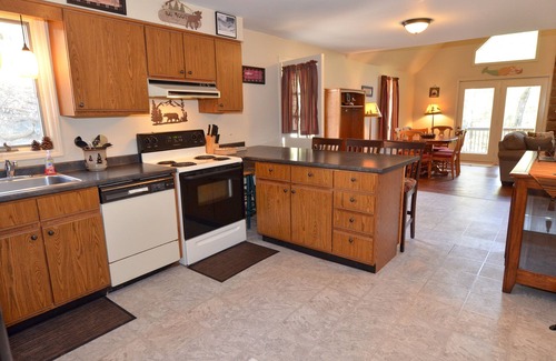 Eidelweiss Village House | Dog Friendly Home, Close to the Beach w/Canoe, Brookside w/Wooded Yard