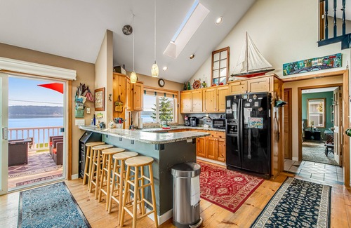 Camano Island House | Dog-friendly home with a great deck, ocean view & firepit on beachfront lawn