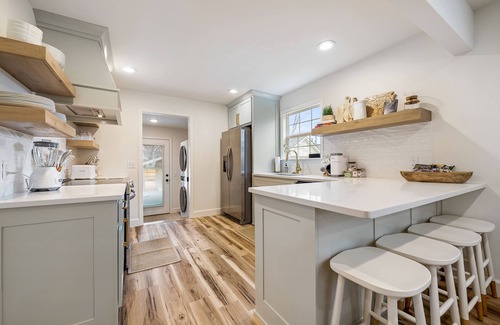Downtown House | Dog-friendly home with a firepit, yard, washer/dryer, central AC & game room