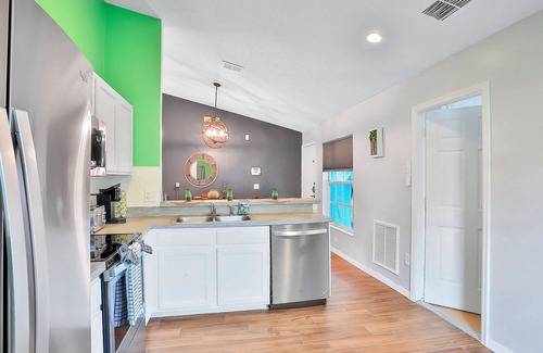 Wellington House | Dog-friendly home with pool, game room, AC, & washer/dryer