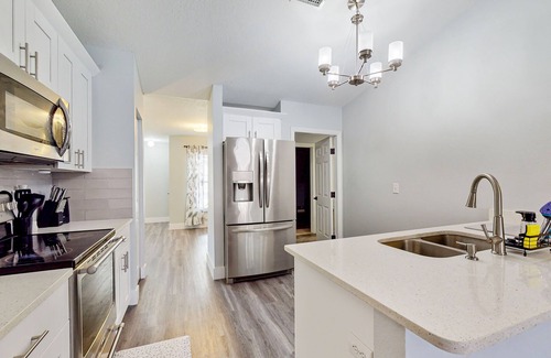 Palmetto House | Dog-friendly home with a private pool, home theater, sunroom, & washer/dryer