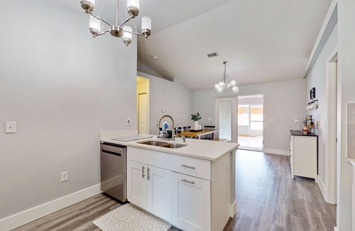 Palmetto House | Dog-friendly home with a private pool, home theater, sunroom, & washer/dryer
