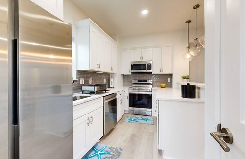 Navarre Beach House | Dog-friendly house near the beach, balconies, washer/dryer, & cable