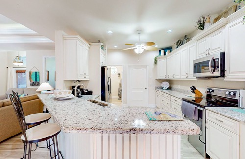 North Port House | Dog-friendly house with heated pool, pool spa, central AC, washer/dryer, & lanai